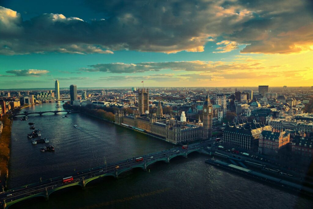 The London, England skyline at sunset from above the Thames River